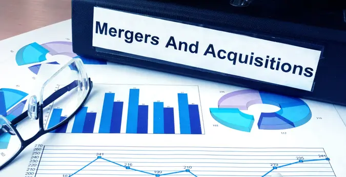 merger and acquisitions binder on top of graphs