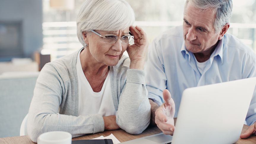 Shot of senior couple using a digital tablet at homehttp://195.