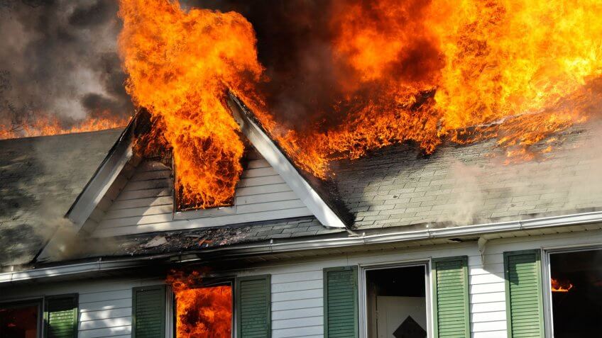 house engulfed in flames