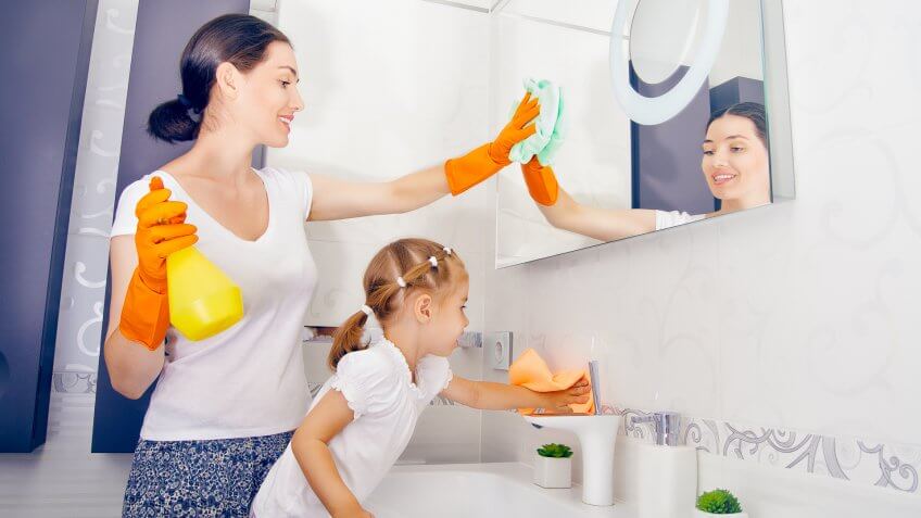happy family do the cleaning.