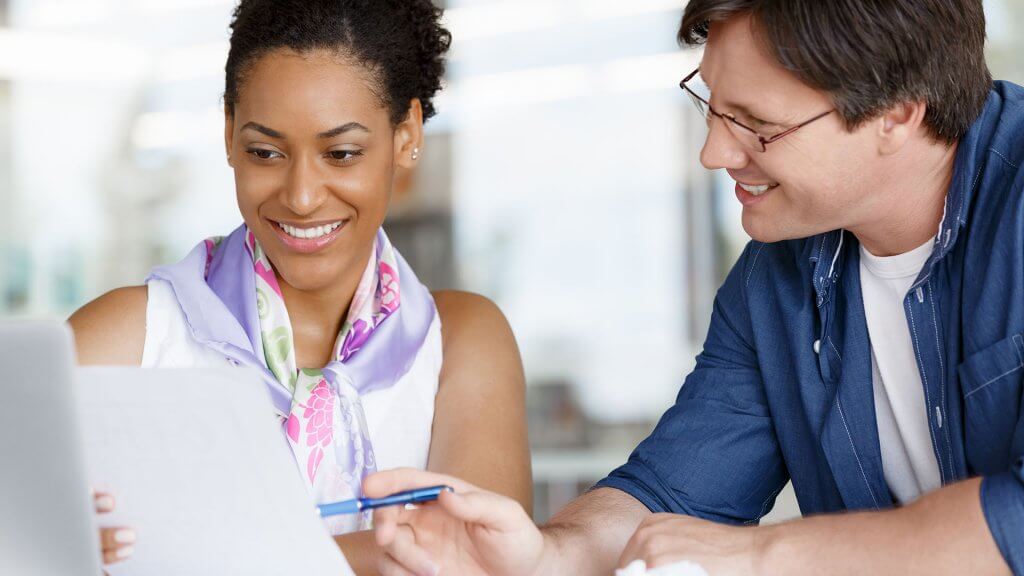 Low-Interest Savings Accounts. man and woman looking over document together