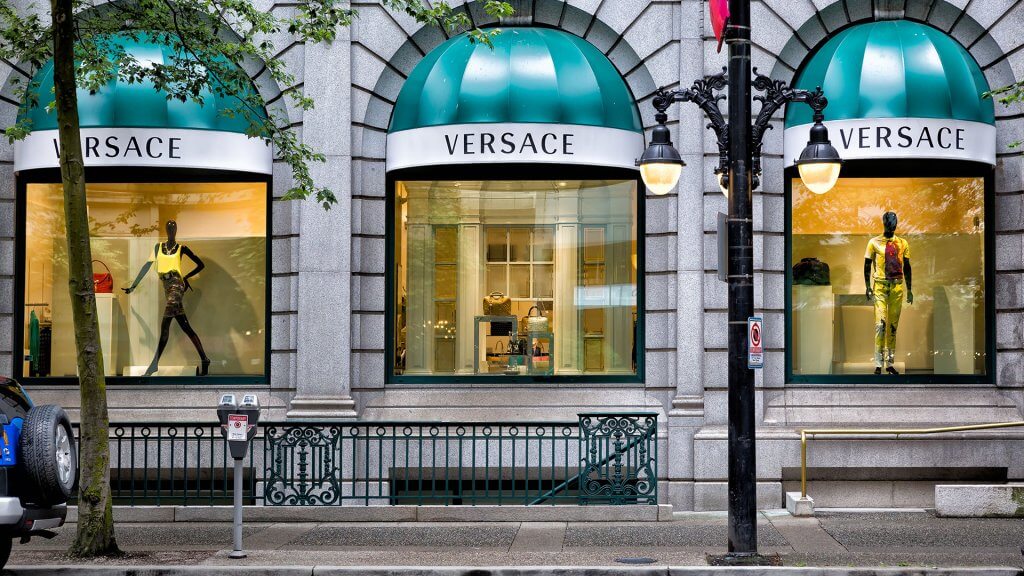 High-End Brands. outside of a Versace store