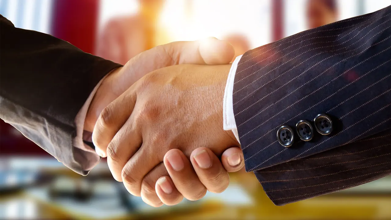 business people shaking hands