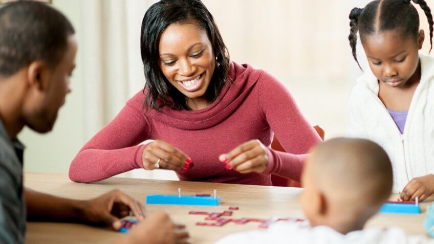family playing a board game