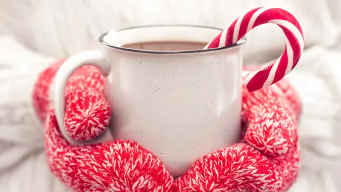 cup of hot chocolate with candy cane