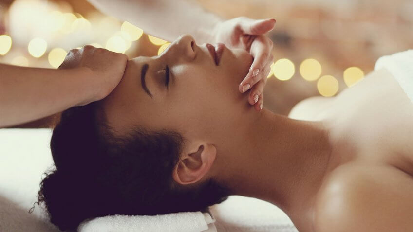 woman getting face massage