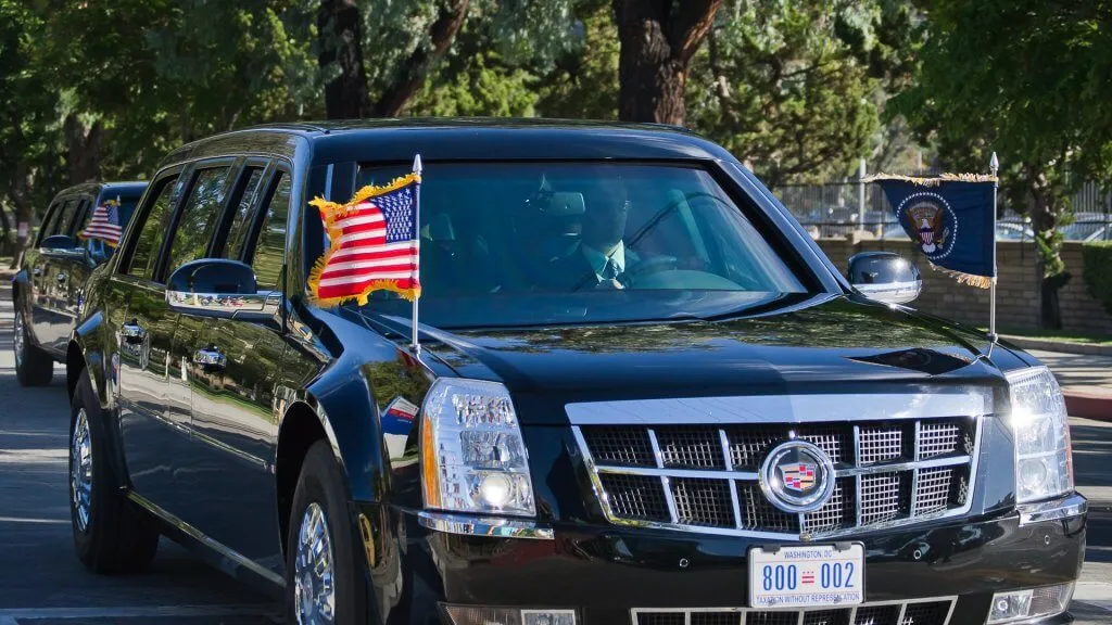 Cadillac limo with American flags