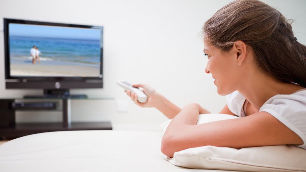 TV Service Plans woman watching TV