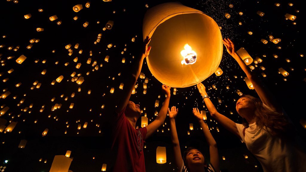 Plan Activities Activities and More Activities people releasing Chinese lanterns into the night sky