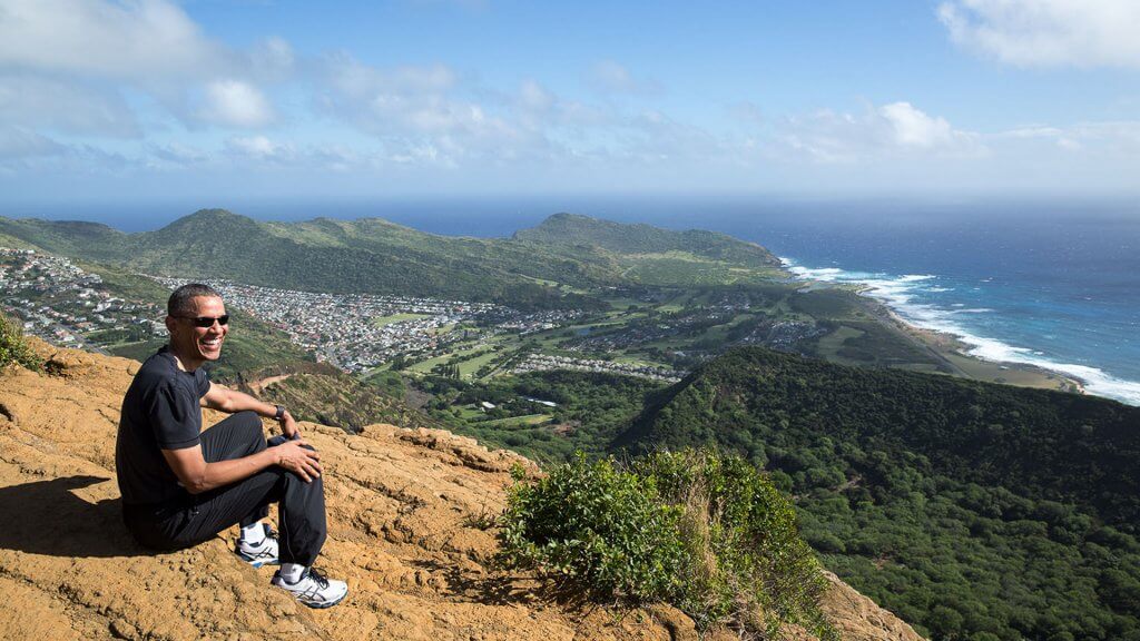 Activities and Leisure Barack Obama sitting on a hiking trail