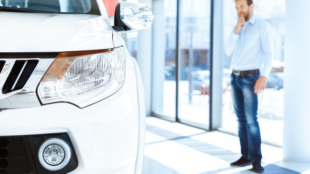 Month 7 Find Your Car potential car customer gazing at car
