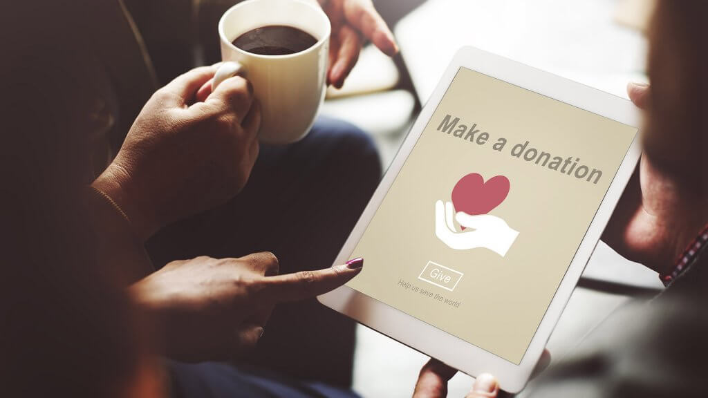 Donate to Charity to Lower Your Tax Bill make a donation on a tablet