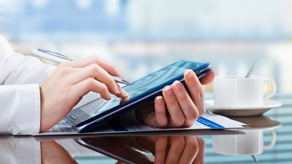 Let It Sit in a Low Interest Account hands using tablet