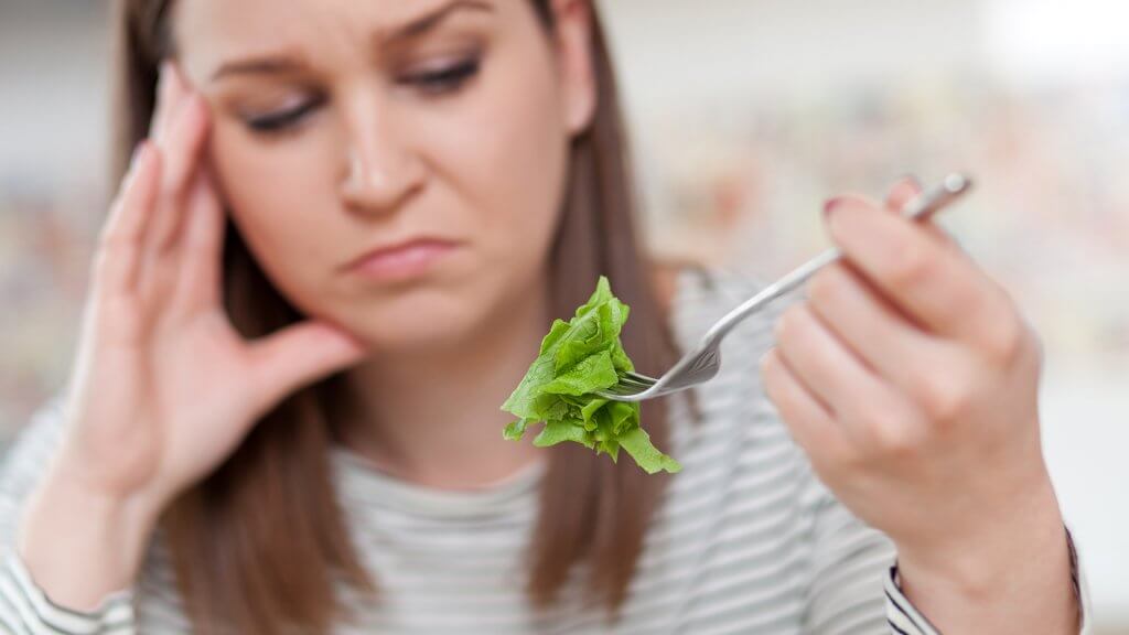 Youll Think Youre on a Diet woman grossed out by lettuce