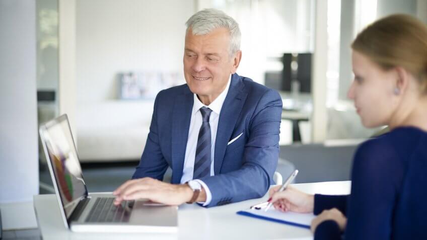 man and woman in a meeting
