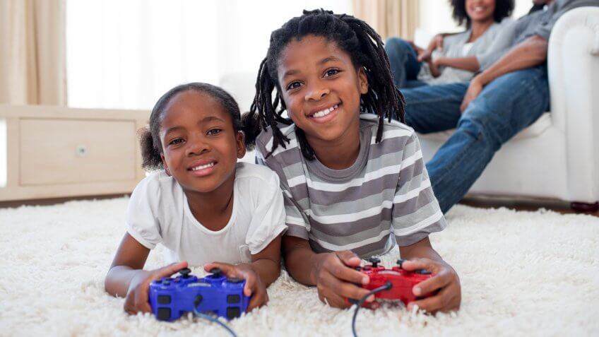two kids playing video games