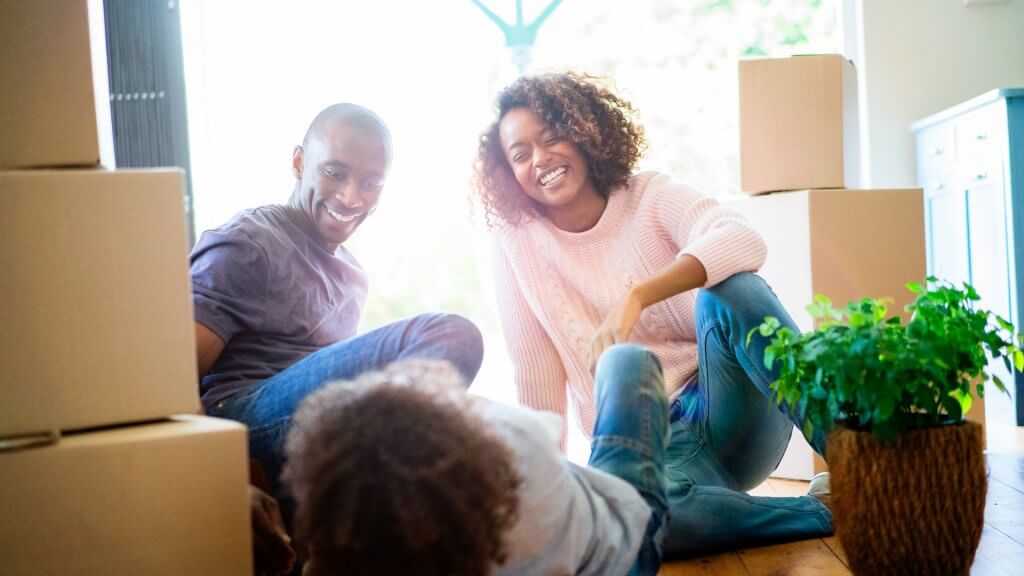 A Spending Plan Can Be Effective happy parents looking at child