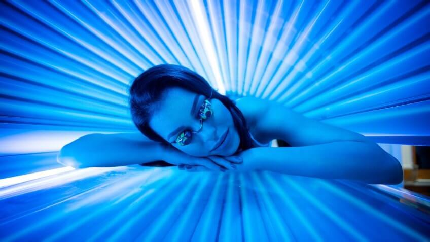 person in tanning bed