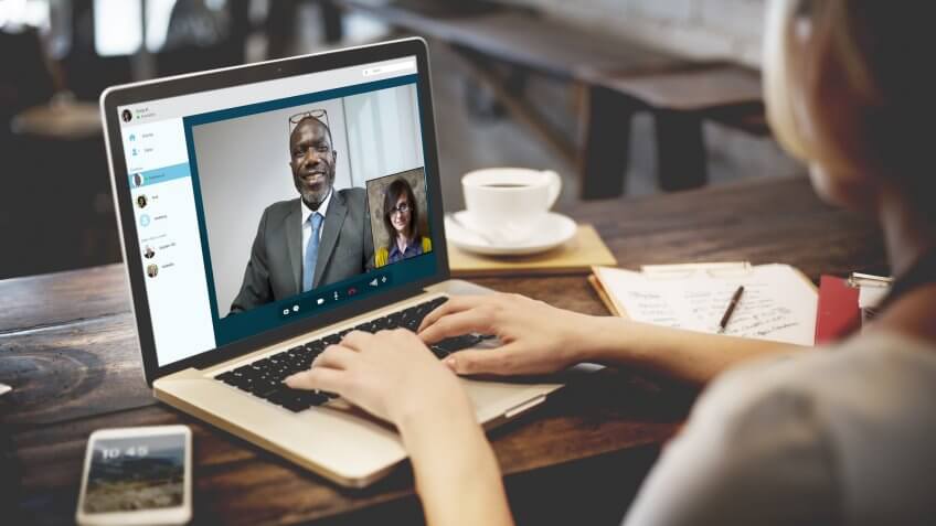 woman on laptop holding a skype facetime call