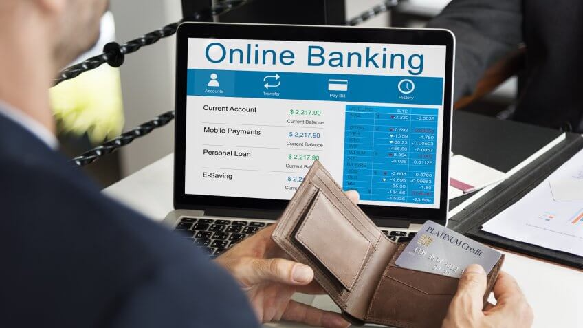 person with wallet on a online banking website