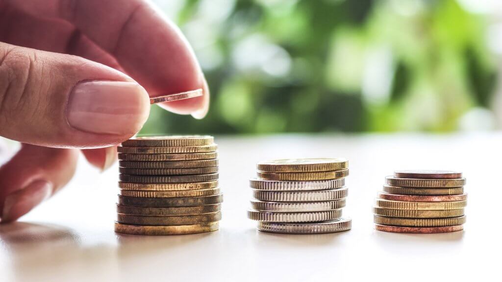 Start Saving for the 2017 Holidays Now stacks of coins