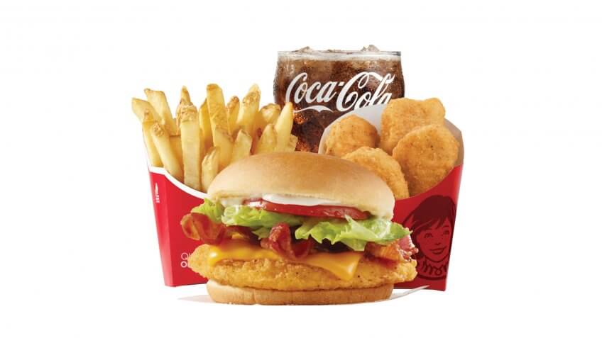 Wendy's sandwich, chicken nuggets, fries, and a soda