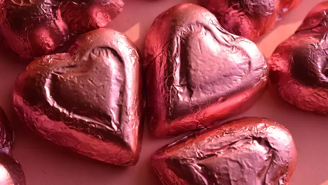 pink foil wrapped chocolate heart shape candy Valentine's Day.