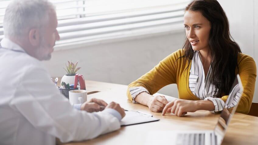 doctor meeting with his patient