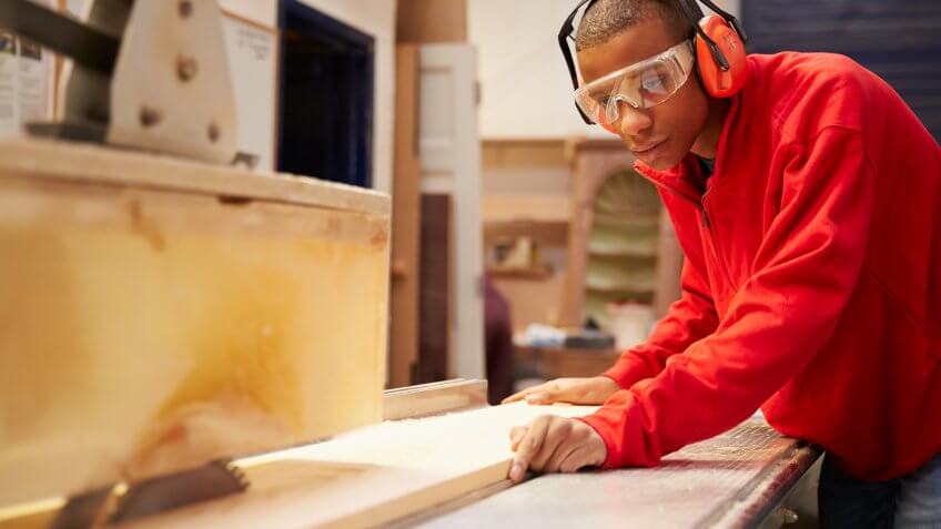 man doing woodwork
