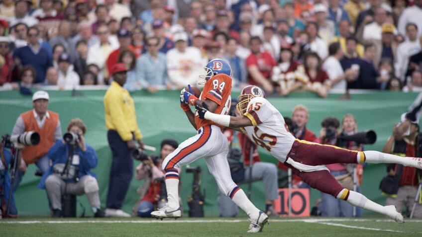 Washington Redskins cornerback Barry Wilburn (45) tries to stop Denver Broncos Ricky Nattiel (84) from getting into the endzone after Nattiel hauled in pass from quarterback John Elway during first quarter of Super Bowl XXII, in San Diego.