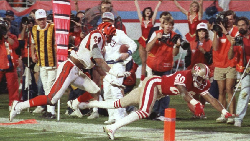 San Francisco 49ers wide receiver Jerry Rice (80) dives into the end zone for a touchdown during third quarter action in Super Bowl XXIII game against the Cincinnati Bengals in Miami, Fla.