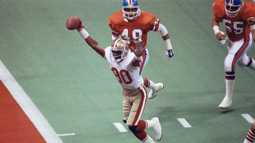 San Francisco 49ers wide receiver Jerry Rice celebrates his first-quarter touchdown against the Denver Broncos during NFL football's Super Bowl XXIV in New Orleans.