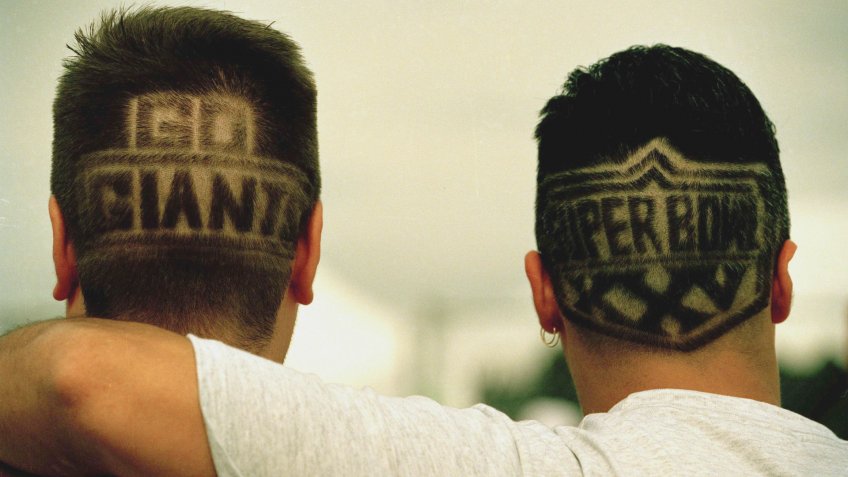 New York Giants fans Ron Kilbride, left, and Vincent Savino, both of New New City, sport the lastest in Hair-dos to show their support of their favorite team in the Super Bowl.