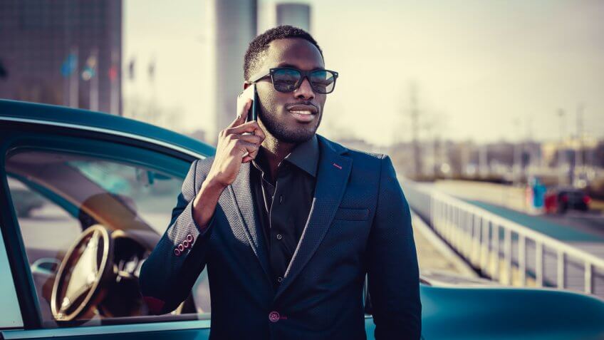 rich young man on his phone