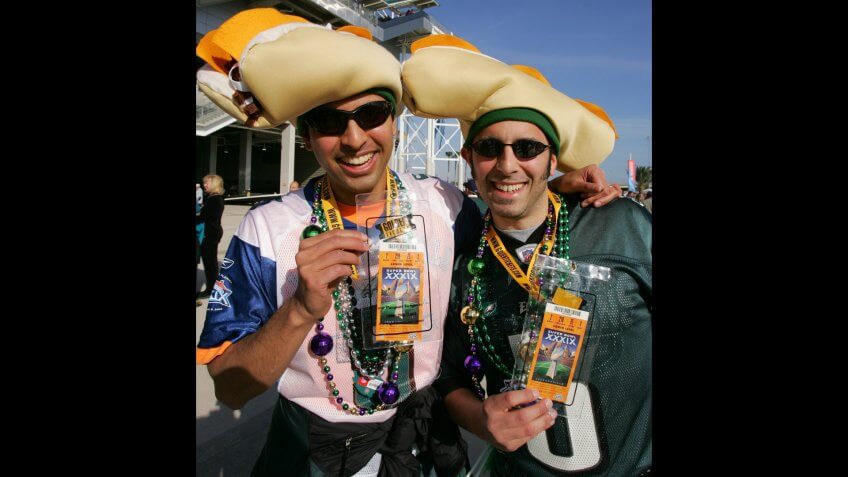 Philadelphia Eagles Fans Indra Chandra (l) and Joshua Partnow Both of Philadelphia Pennsylvania Show Off the Two Super Bowl Tickets They Purchased For $2500 Usd Each Outside Alltel Stadium in Jacksonville Florida Several Hours Before the Start of Super Bowl Xxxix Sunday 06 February 2005 the Afc Champion New England Patriots Will Face the Nfc Champion Philadelphia Eagles in the National Football League's Annual Championship GameUsa Nfl Super Bowl Xxxix - Feb 2005.