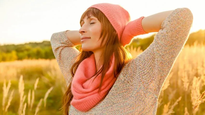 woman looking relaxed outside
