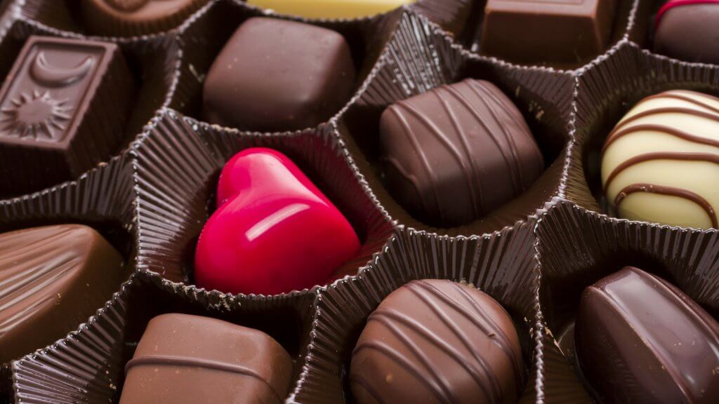 Assorted gourmet chocolate in a box.