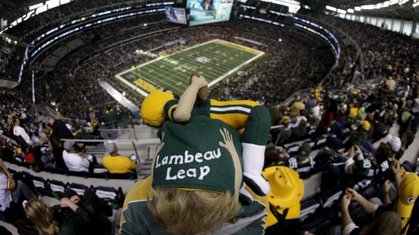 A Green Bay Packers fan looks down on the field before the start of the NFL Super Bowl XLV football game against the Pittsburgh Steelers, in Arlington, TexasSuper Bowl Football, Arlington, USA.