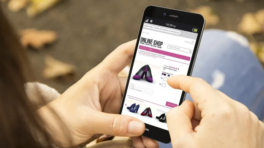 woman online shopping for shoes high heels