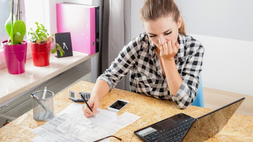 young woman planning finances