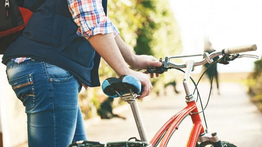 man about to sit on his bicycle