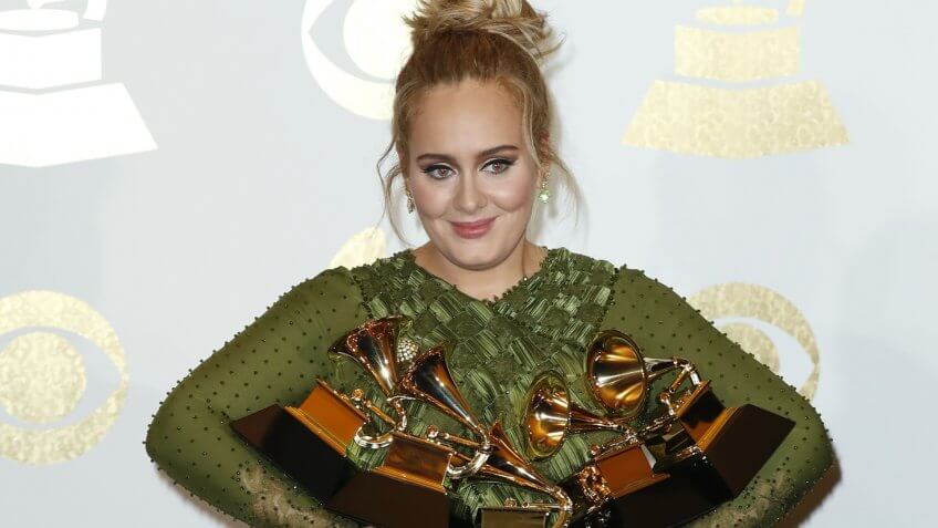 Mandatory Credit: Photo by MIKE NELSON/EPA/REX/Shutterstock (8344941ed)AdelePress Room - 59th Annual Grammy Awards, Los Angeles, USA - 12 Feb 2017Adele holds up her awards in the press room during the 59th annual Grammy Awards ceremony at the Staples Center in Los Angeles, California, USA, 12 February 2017.