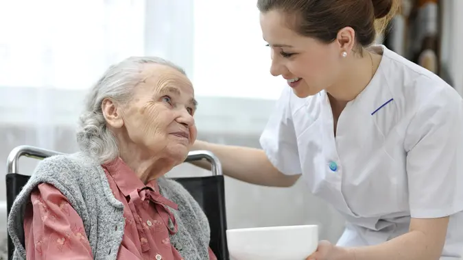 elderly woman with nurse