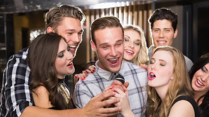 group of friends signing karaoke
