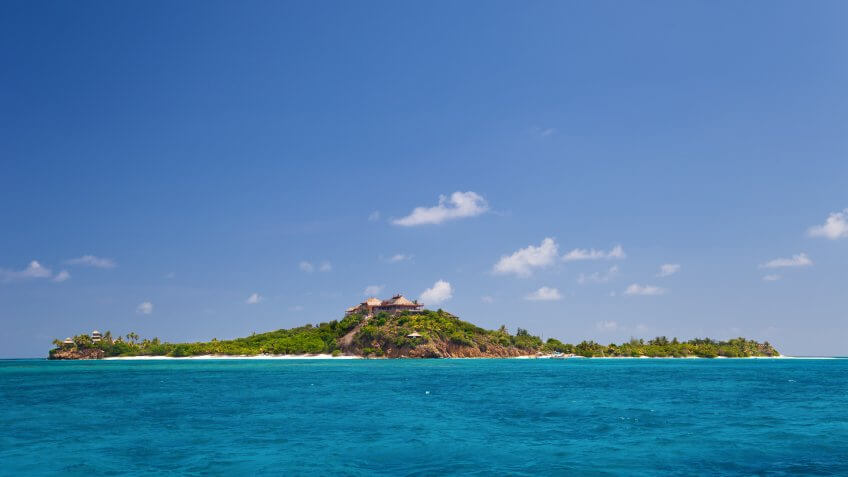 view of luxurious Necker Island, British Virgin Islands taken from a boat.