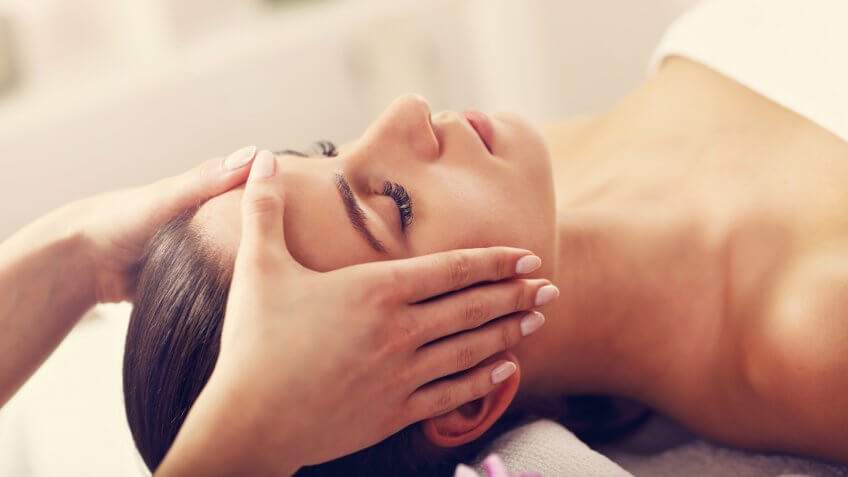 woman getting massage in spa