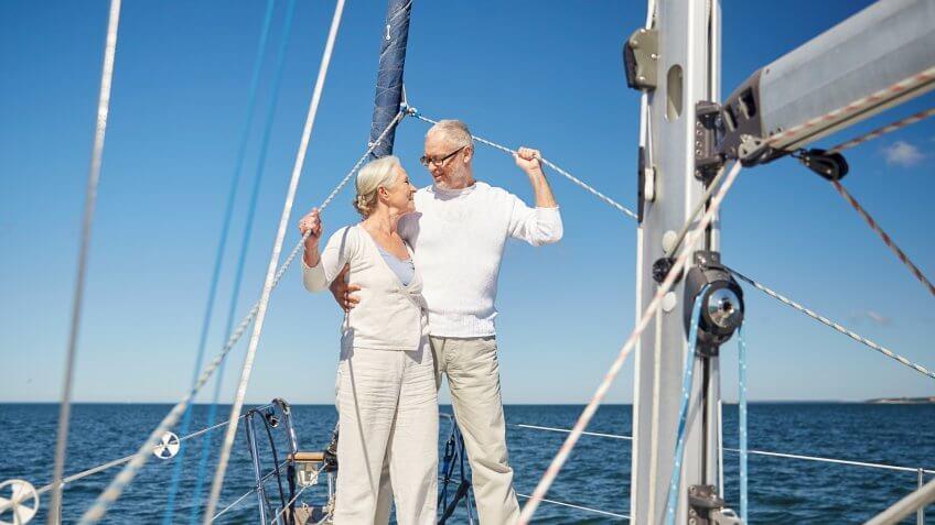 senior old retired couple on a boat