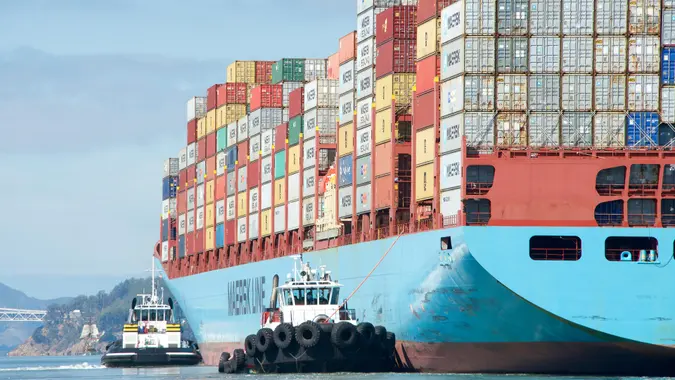 A cargo ship with a lot of cargo on it