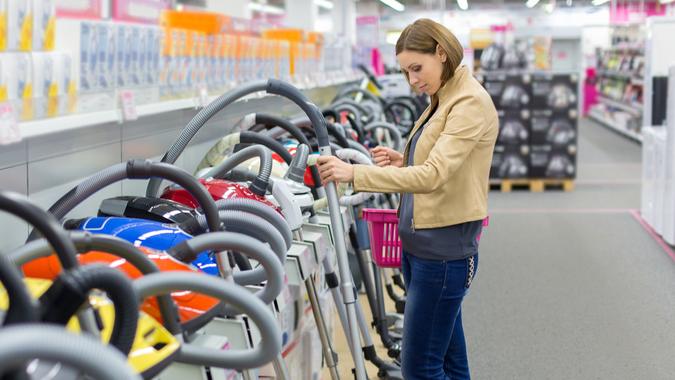 woman buys a vacuum cleaner