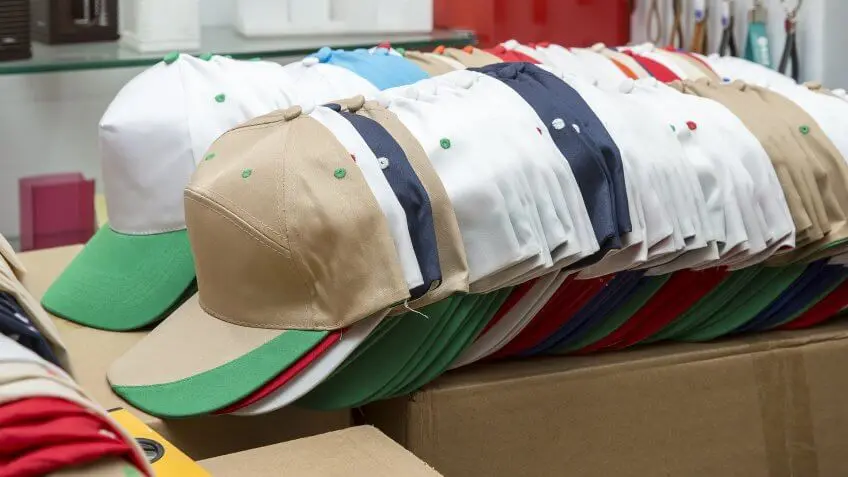stack of hats caps